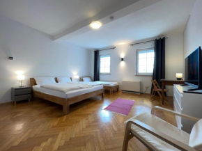 Übernachten in großer Maisonette-Wohnung by Rabe